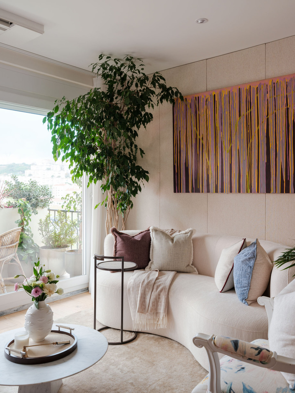 Renovated classic contemporary living room in a Lisbon apartment by Dias Vasconcelos Interiors